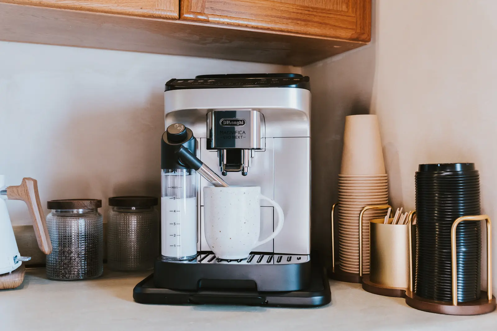 Coffee corner with machine, cups and beans