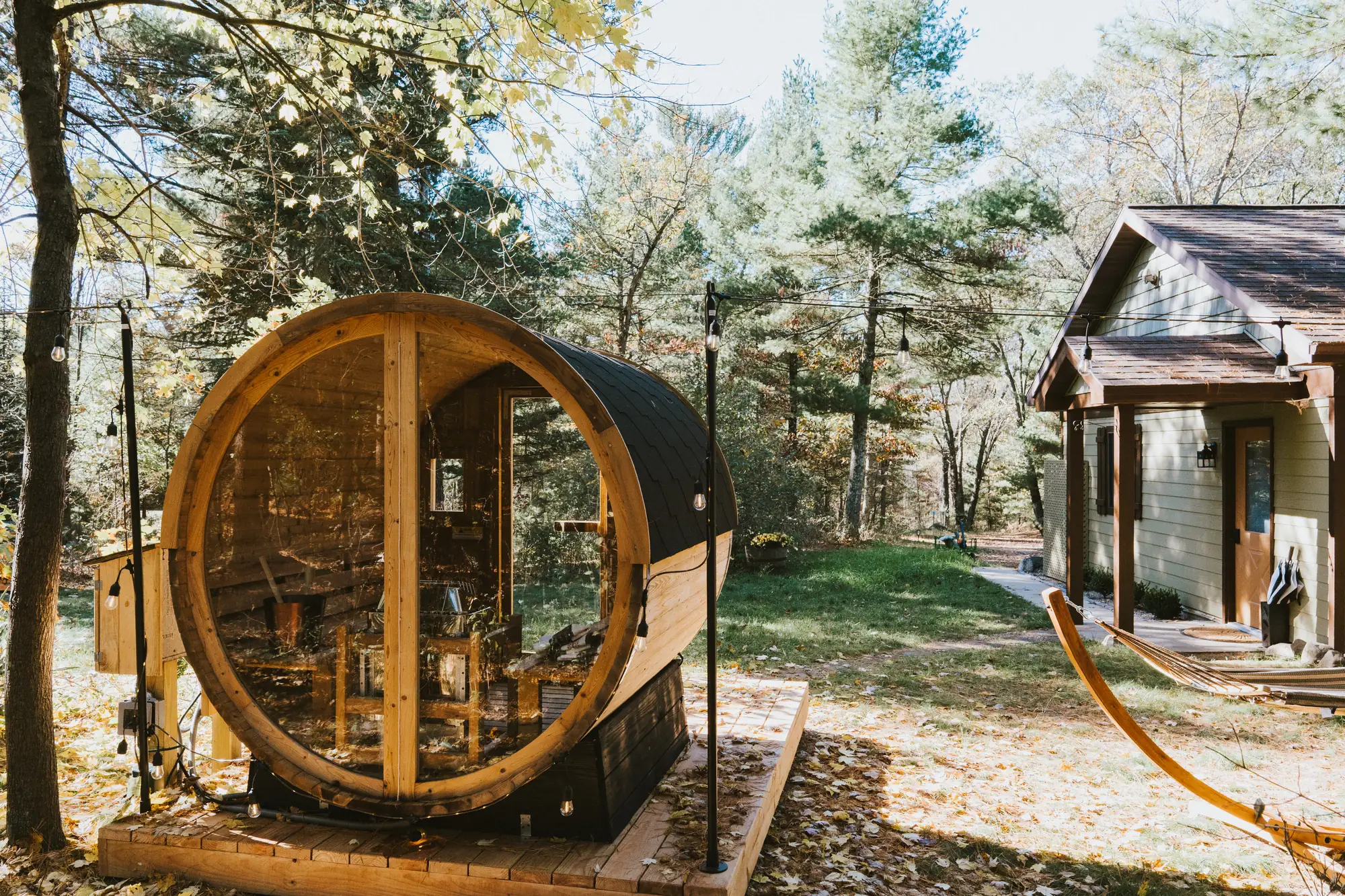 Barrel sauna among the trees